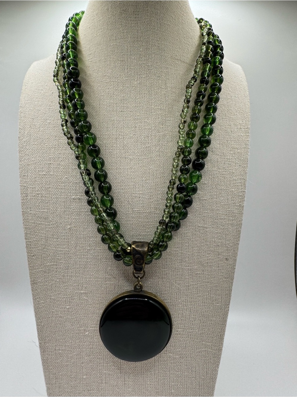 Multi-Strand Green Glass Beaded Necklace with Dark Green Cabochon  Pendant